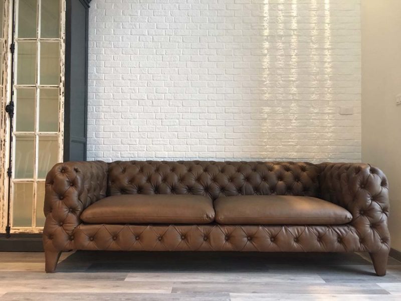 Italian design leather sofa in cozy living room
