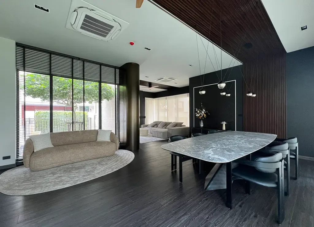 Turnkey interior design in Bangkok featuring a modern luxury living and dining room by Elementi Interiors
