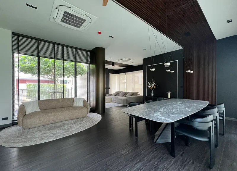Turnkey interior design in Bangkok featuring a modern luxury living and dining room by Elementi Interiors