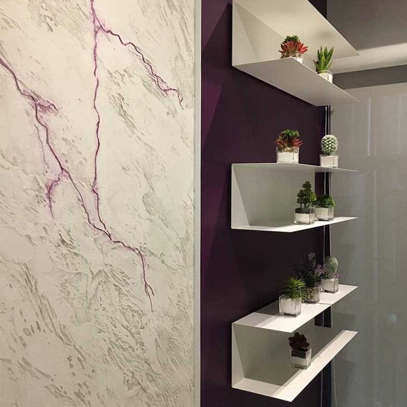 Shelves on purple wall | Elementi Interiors