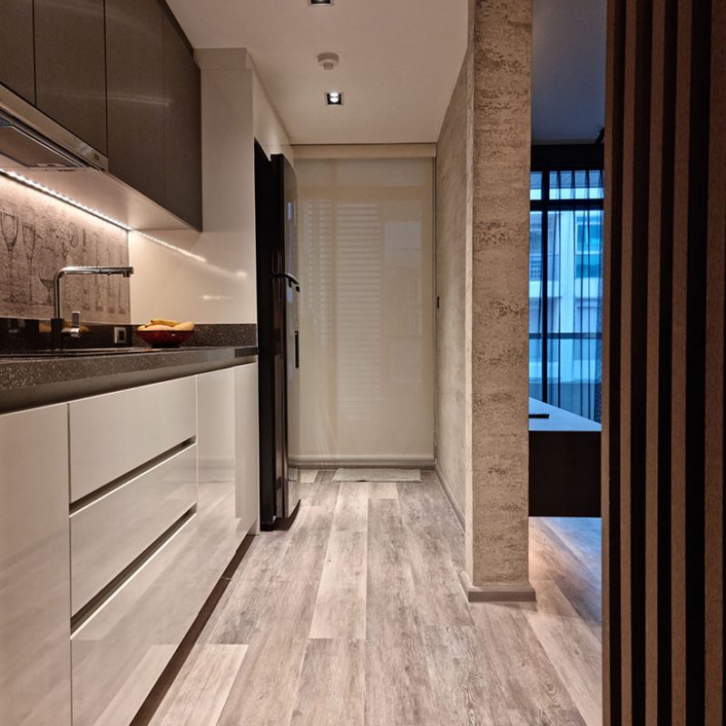 White high gloss kitchen | vinyl flooring | The Link 5 renovation